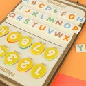 Tablica manipulacyjna sensoryczna montessori walizka dinozaury Tablica manipulacyjna sensoryczna montessori walizka dinozaury