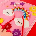 Tablica manipulacyjna sensoryczna montessori walizka plecak różowa Tablica manipulacyjna sensoryczna montessori walizka plecak różowa